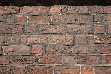 Wall Mural - old wall with red bricks as a background