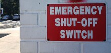 Emergency Shut Off Switch Sign At Gas Station