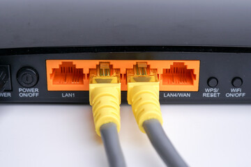 WiFi Modem Router ADSL connected with LAN RJ45 Cable. It is a LAN network connection ethernet cable. Internet cord RJ45
