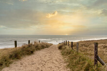 Sunset Over The North Sea With A View From A Sandy Dune Path Towards The Sea Near Noordwijk, Netherlands