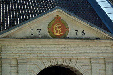 Wall Mural - An ancient city, located inside an old fortress. Preserved style and architecture of antiquity. Historical town Fredrikstad.Named after the Danish King Fredericks II.  Fredrikstad,Norway