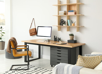 Poster - stylish room interior with modern comfortable workplace