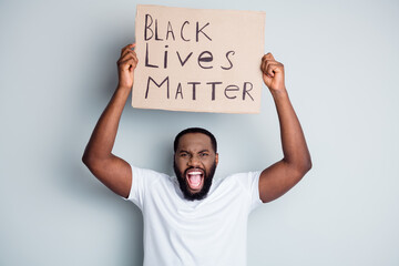 Photo of crazy yell dark skin african city protester placard show negative attitude black citizens social lawlessness stop murder black people human concept isolated grey color background