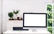 © Art_Photo - Creative desktop computer with white mockup blank screens on table in modern minimal white work loft