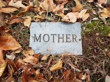 Mother On Granite Or Marble Grave Stone In Cemetery