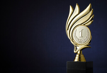 Wall Mural - winners gold trophy with medallion and swirl