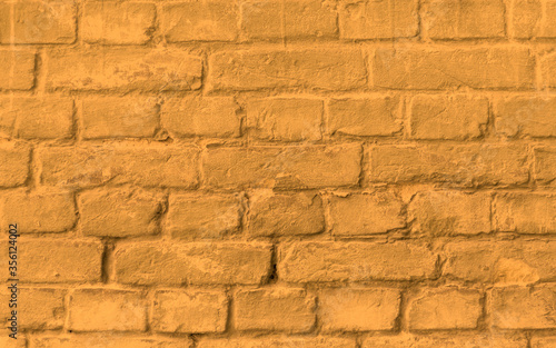 Old crumbling orange wall.