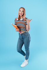 Sticker - Image of laughing girl holding exercise books and pointing finger aside