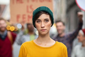 Determined young woman in protest