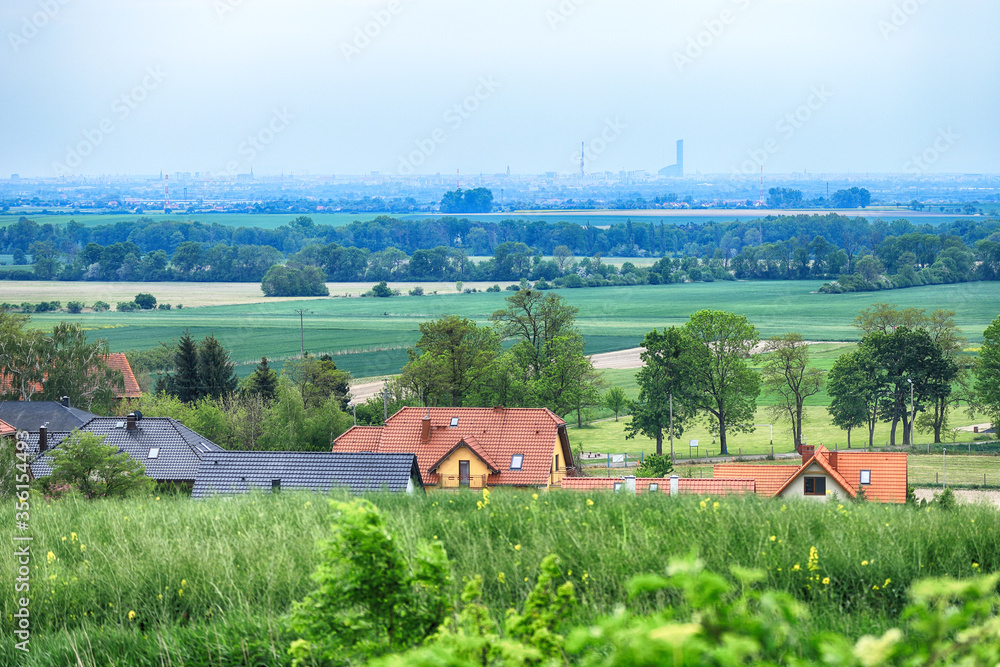 WROCLAW, POLAND - MAY 28, 2020: Panorama of Wroclaw, view from the Trzebnica hills (20 km in a straight line). - obrazy, fototapety, plakaty 