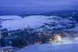 Winter landscape in the mountains with the village Oberwiesenthal in Germany with snow at night