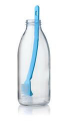 Wall Mural - Blue plastic brush in glass bottle