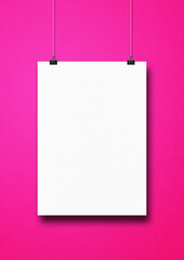 Sticker - White poster hanging on a pink wall with clips