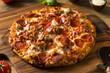 © Brent Hofacker - Savory Homemade Meat Lovers Pizza