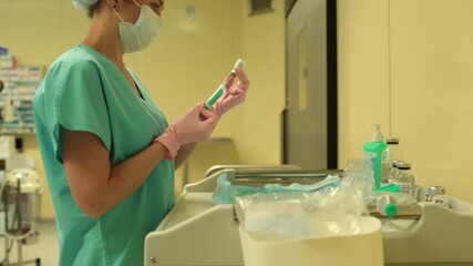 Wall Mural - Assistant helps the surgeon during the operation