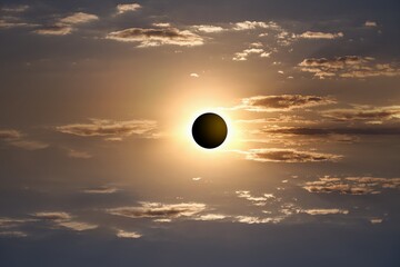 Wall Mural - colorful eclipse of the sun in clouds sky , apocalypse sunset