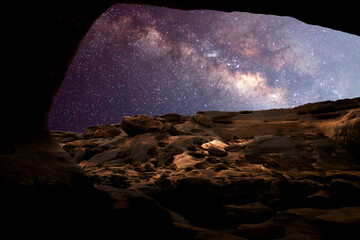 Wall Mural - milky way with people on the mountain. landscape with night sky with stars and silhouette of standin