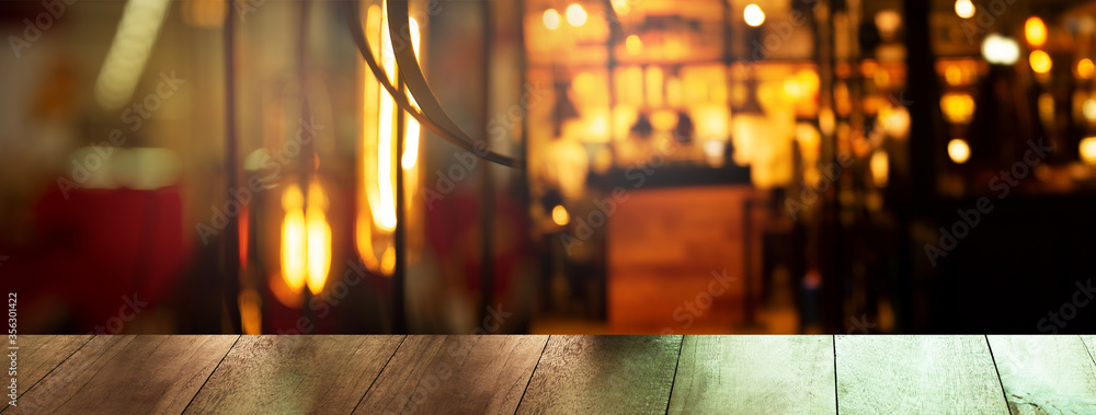 top of wood table with blur bar or pub with dark night party light city interior banner background - obrazy, fototapety, plakaty 