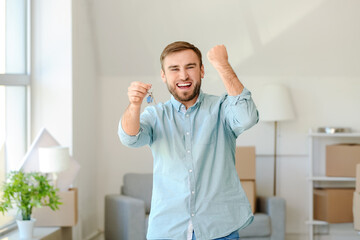 Wall Mural - Happy young man in his new flat on moving day