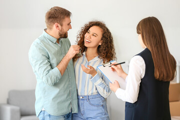 Poster - Happy young couple with real estate agent in their new flat