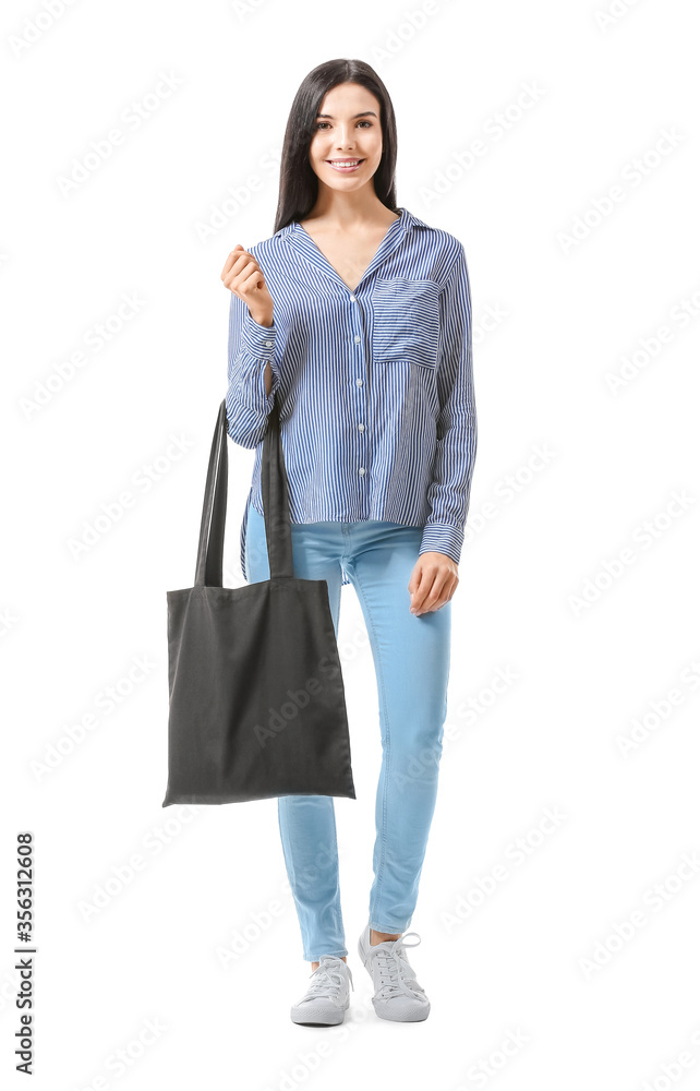 Young woman with eco bag on white background