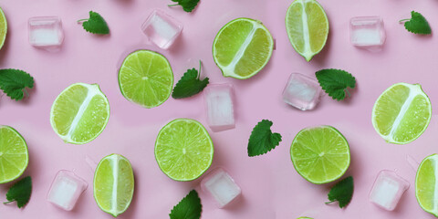  Mint, lime, ice, ingredients and bar utensils for making mojito cocktail on pink background. top view. to make a drink of lemonade, cold iced tea, a cocktail, mojito, detox. banner