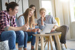 © goodluz - group of young people working on a laptop