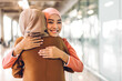 © Art_Photo - Portrait of happy arabic two friend muslim woman with hijab dress smiling and hugging together