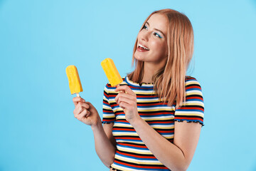 Sticker - Image of cheerful pretty girl holding ice-cream and laughing