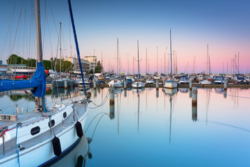 Wall Mural - Beautiful sunset over the marina at Baltic Sea with yachts in Gdynia, Poland.