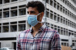 © Wavebreak Media - Caucasian man wearing a covid19 coronavirus mask outside