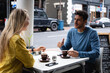 © Wavebreak Media - Caucasian couple in the city sitting at a coffee terrace
