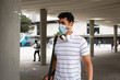 © Wavebreak Media - Caucasian man on the go wearing a covid19 coronavirus mask outside
