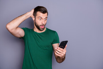 Poster - Crazy astonished guy use smartphone search corona virus social media information impressed share post scream omg touch head hand wear good look clothes isolated gray color background