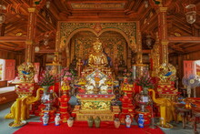 View Of Golden Upagupta Buddha Statue On Base In Buddhist Temple, Wat Ming Muang, Chiang Rai, Northern Of Thailand.