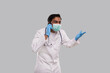 © Alex - Doctor Angry Talking on Phone Wearing Medical Mask and Gloves. Indian Man Doctor with Phone Isolated