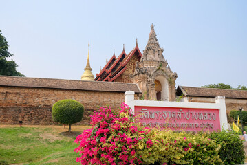 Area entrance gate of Wat Phra That Lampang Luang, Lanna pagoda in Lampang. One of the landmark and Many people come to worship the holy thing at Lampang province, Thailand.