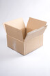 © Liza - isolated close up shot of a single open blank brown empty carton cardboard box on a white background