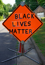 Orange Caution Sign In Richmond, Virginia Neighborhood Reinvented To Read BLACK LIVES MATTER.   