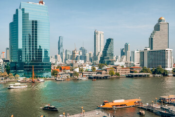 Wall Mural - Bangkok cityscape with business skyscrapers at Chaopraya river