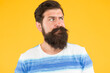 © be free - male barber care. get style in barbershop. bright life living. brutal bearded man on yellow background. male summer fashion. mature hipster has moustache. displeased looking guy. Make hair stronger