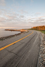 A Road Hugs The Rugged Coastline In Acadia National Park, Maine