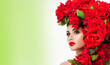 © Svetlana Fedoseeva - Beautiful woman face surrounded by red roses. Perfect skin. Professional makeup.
