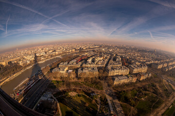 Wall Mural - Paris France famous Eiffel Tower view during sunset from top of tower to city landmark