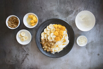 Wall Mural - Mango, Banana and Coconut Yogurt with Granola and Honey