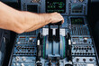 © Cien X Cien Studio/ADDICTIVE STOCK - Pilot operating airplane in cockpit