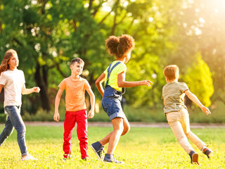 Poster - School holidays. Group of happy children playing outdoors