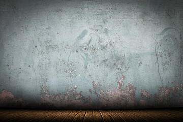 The old blue wall on the wooden floor vintage texture background.