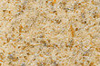 © Kat Ka - Brown sugar scrub texture background. Natural cosmetic exfoliation product closeup. Top view