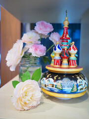 Roses and souvenirs from Russia in my living room